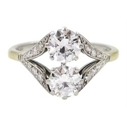 Early-mid 20th century two stone diamond ring, with diamond set shoulders, stamped Plat, each larger diamond approx 0.70 carat, total diamond weight approx 1.50 carat