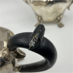 Five piece Edwardian silver tea service, comprising teapot and coffee pot, each with ebonised scroll handle, tea caddy with hinged cover, twin handled open sucrier, and milk jug, each of rounded bombe form, upon four paw feet, hallmarked William Adams Ltd, Birmingham 1904 and 1905, coffee pot H26cm
