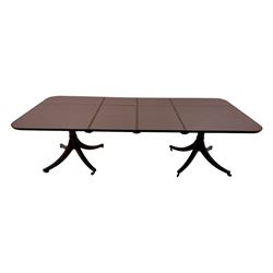 Regency design mahogany twin pillar dining table, two additional leaves, on turned supports with four out-splayed supports 