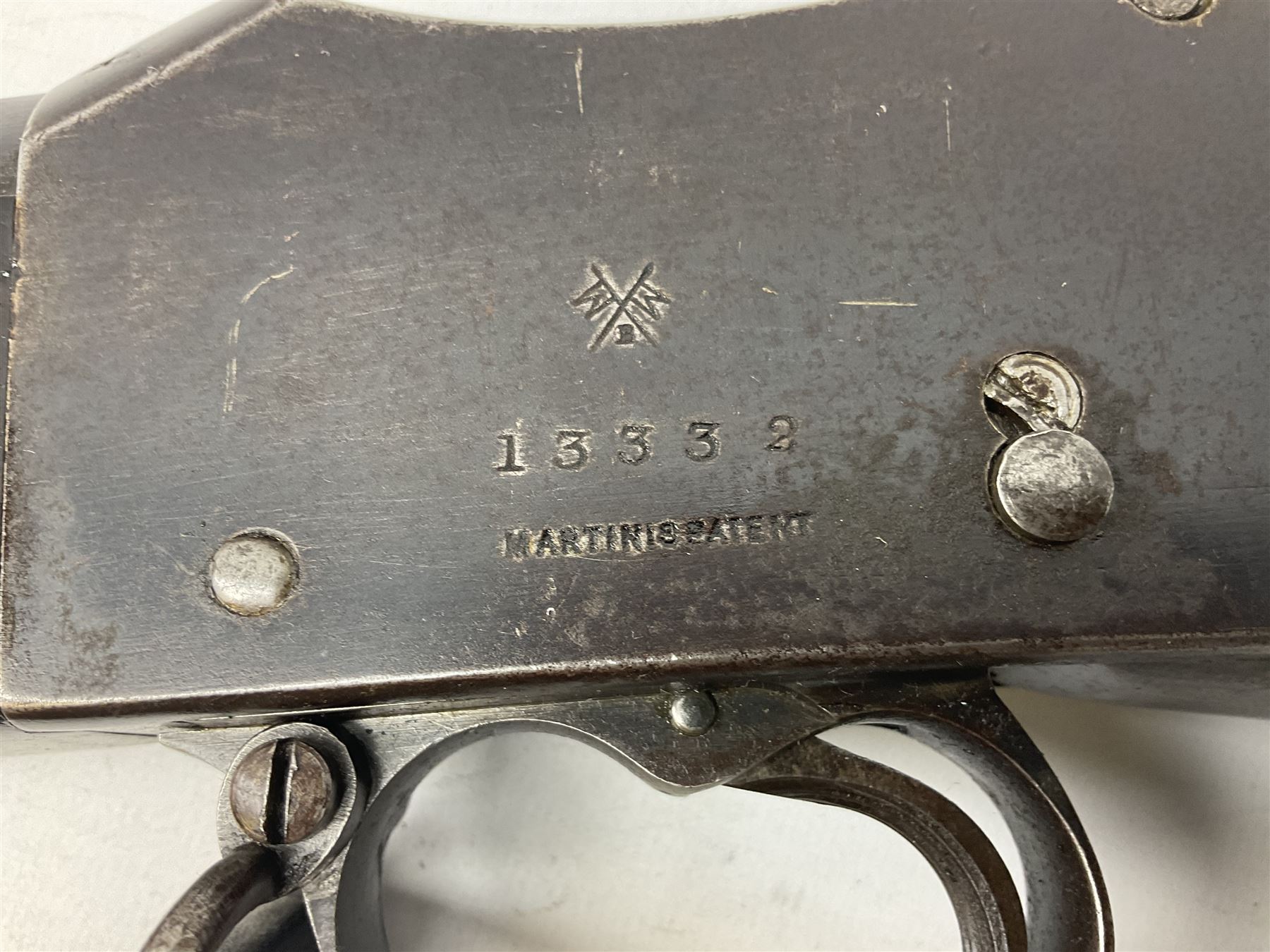 Braendlin Armoury Martini action .577/450 falling back rifle, the 85cm rifled barrel stamped Alex. Henry Edinburgh & London with two barrel bands including Yatagan bayonet side fitting and clearing rod under, with leather sling, serial no.13332, L126cm (NB. Firing pin broken). 