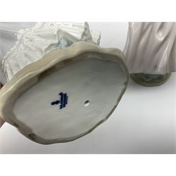 Three Lladro figures, comprising, Dreams of Summer Past no 6401, Spring Breeze no 4936 and Breezy Afternoon 5682 together with Lladro plaque Art Brings us Together no 7677, all in original boxes, largest example H35cm