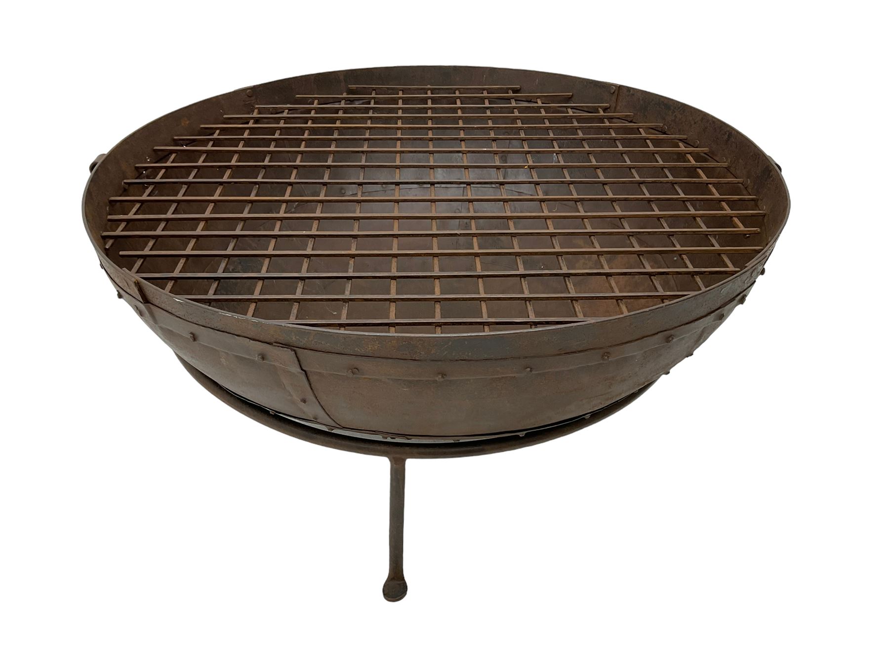 Circular riveted iron fire pit, strapwork sides with twin handles on stand, with grate
