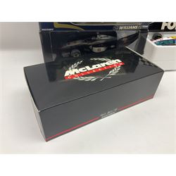 Four Minichamps 1:18 scale die-cast racing cars - Williams F1 Team BMW FW26 R. Schumacher; McLaren Mercedes MP4-12 D. Coulthard; McLaren Mercedes MP4-13 M. Hakkinen; and Formel 1 Jordan peugeot EJR 195 E. Irvine; all boxed (4)
