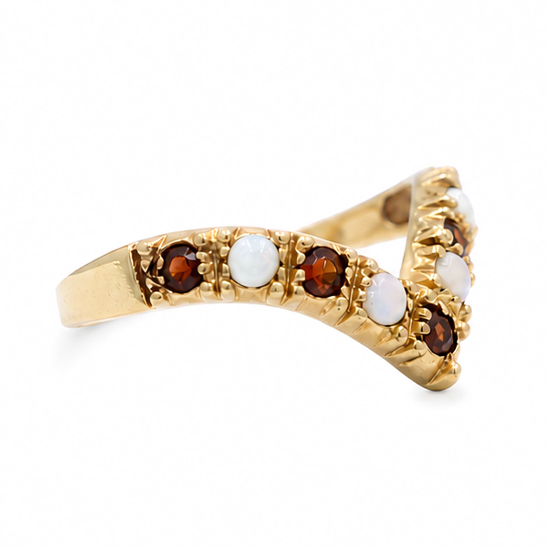 9ct gold garnet and opal wishbone ring, set with alternate round cut garnets and cabochon cut opals, London 1980