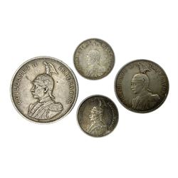 German East Africa 1892 one rupie, 1906 half rupie, and two quarter rupie coins dated 1910, 1913