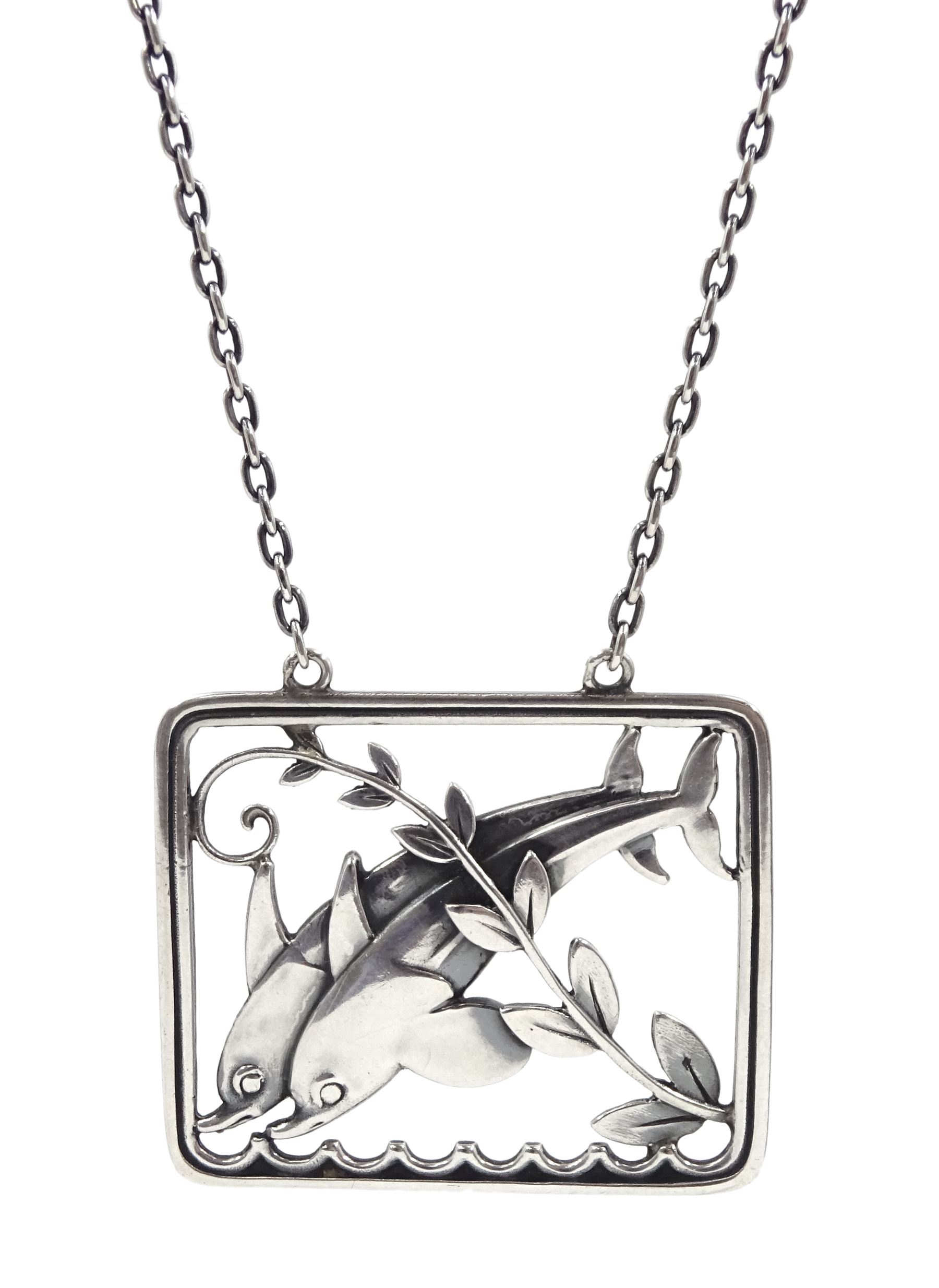 Silver double dolphin pendant necklace designed by Arno Malinowski for Georg Jensen, No. 94