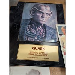 Collection of Star Trek The Next Generation and Deep Space Nine memorabilia, including two limited edition signed Star Trek Deep Space Nine photographs, commemorative porcelain plaque, insignias, Encounter at Farpoint pewter plaque, signed photograph of the Voyager crew, two signed copies of Convergence and a signed War & Madness graphic novel, canvas prints and other signed photos, together with Star Wars Ray Park (Darth Maul) signed photograph, UFO and Buck Rogers memorabilia