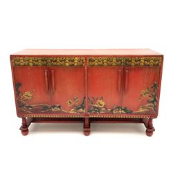 Early 20th century Chinese style red painted finish sideboard, two doors enclosing two slides turn supports joined by stretches on bun feet
