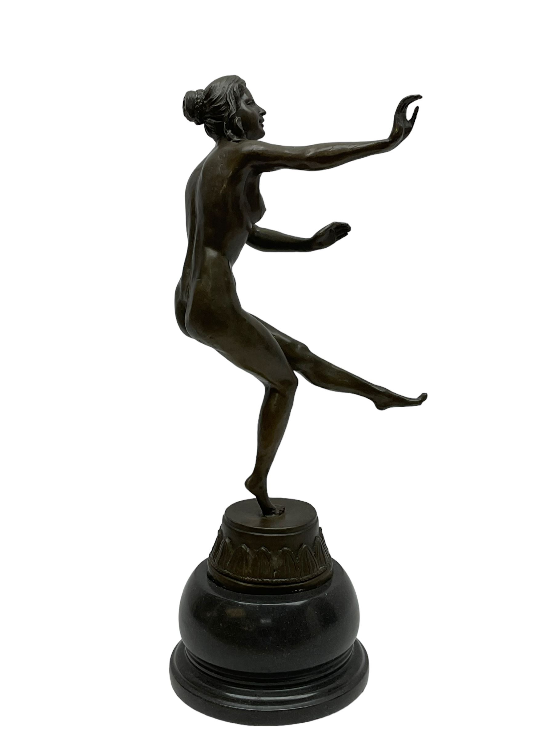After Claire Jian Robertine Colinet (1880-1950); Art Deco style bronze, modelled as a dancing nude figure upon a marble base, H22cm