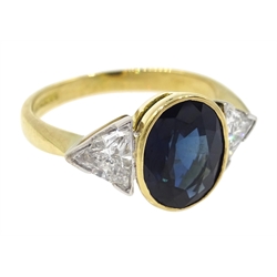  18ct gold oval sapphire and two trillion cut diamond ring, hallmarked, sapphire 2.18, diamond total weight 0.52 carat  