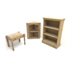 Narrow pine open bookcase, two shelves, plinth base (W62cm, H93cm, D26cm) a pine wall hanging cupboard (W58cm, H69cm, D32cm) and stool