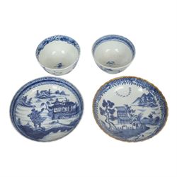 Two 19th century Chinese blue and white tea bowls, each decorated with traditional landsca...