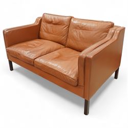 Stouby - Danish design two-seater sofa, upholstered in tan leather with loose cushions and square tapering stained hardwood legs