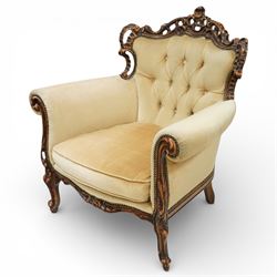 Late 19th century style carved hardwood armchair, the openwork crest rail with scrolling and foliate ornament, upholstered back and outscrolled arms with buttoning, loose seat cushion, nailhead trim, on carved cabriole legs