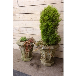  Pair of large composite stone octagonal garden planters, with Gothic panel tapering sides on stepped bases, D61cm, H60cm (2)  