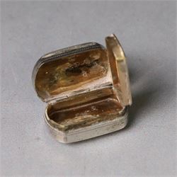 Two George III silver vinaigrettes, the first of rectangular form, the hinged cover modelled as a strap and engraved with acanthus leaves and flower heads, opening to reveal a foliate pierced gilt grille, hallmarked IT, Birmingham 1792, W2.5cm, the second of oval form, the hinged cover engraved 'C M Church' within a foliate border, opening to reveal diamond pierced gilt grille, hallmarked Cocks & Bettridge, Birmingham 1805, W2.5cm