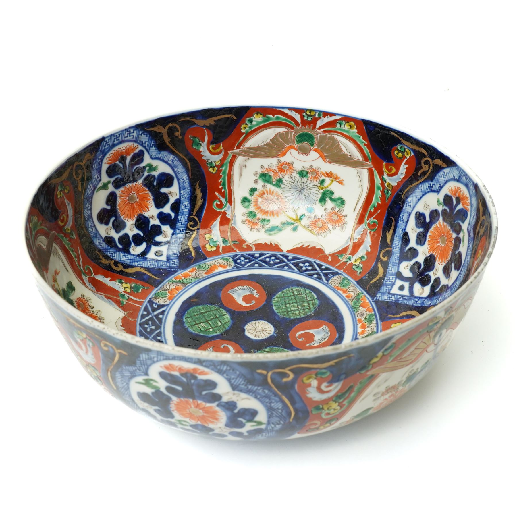 Late 19th/Early 20th century Japanese Imari bowl decorated with panels of flowers in blue, orange and green etc D27cm, Imari vase H24cm and a small ginger jar (3)