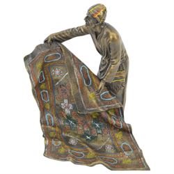 After Franz Bergmann bronzed sculpture of a carpet seller, with colourful painted highlights throughout, H19cm