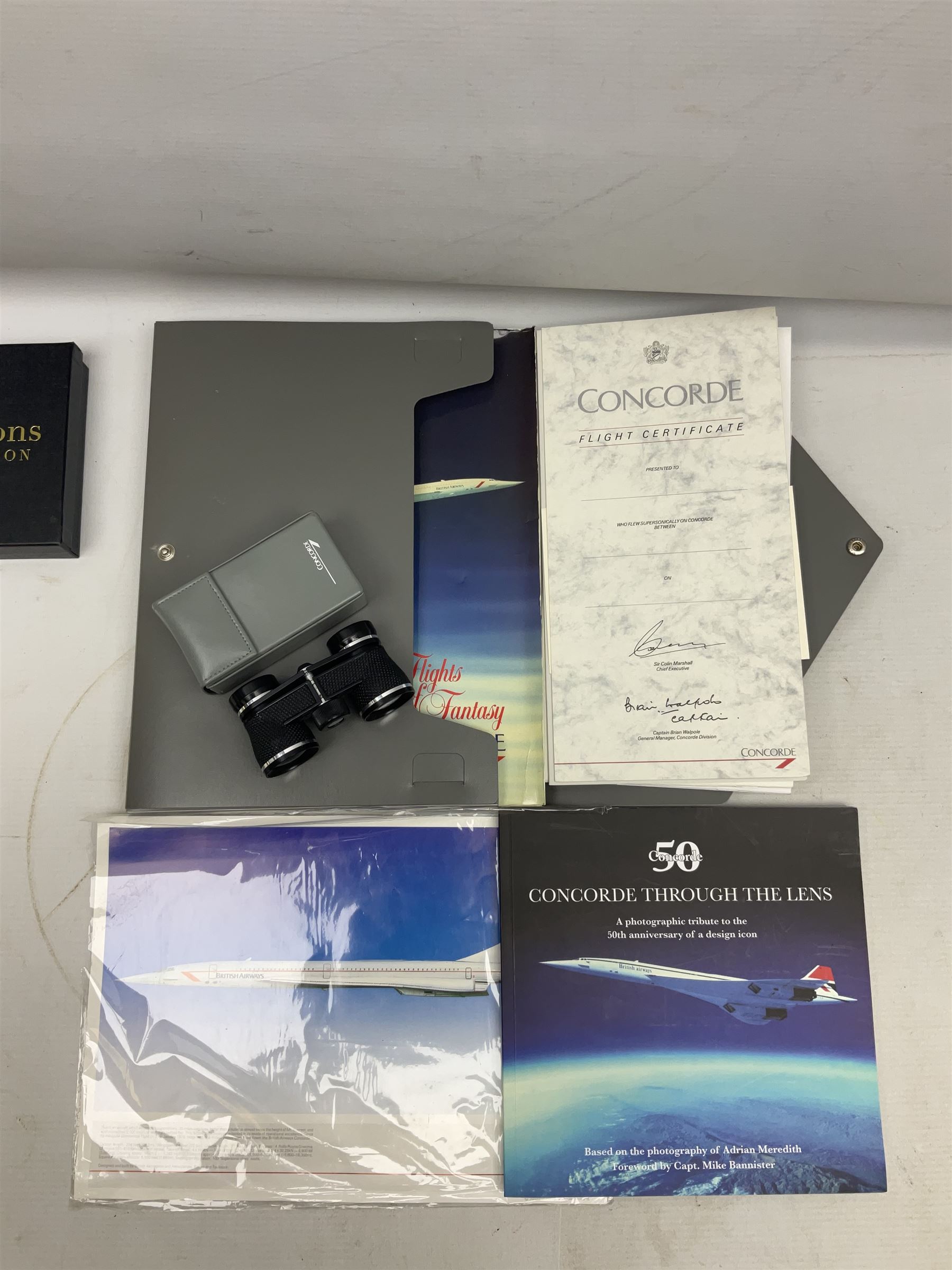 Queen Elizabeth II Gibraltar 2019 'The Concorde 50th Anniversary Gold Sovereign Prestige Set', comprising full, half and quarter sovereigns, cased with certificate, together with various items of Concorde memorabilia including cased binoculars, flight certificate for Heathrow to Moscow, 'Concorde Through The Lines' photographic tribute book etc
