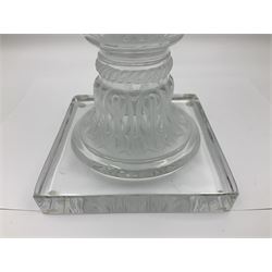 Large and impressive Lalique Versailles pattern glass vase, of classical baluster form with gadrooned flared rim, the body moulded in relief with fruiting vines above part fluting, upon a spreading circular foot with moulded decoration, and plain square plinth base, signed Lalique France to side of plinth, overall H35cm, with original box 