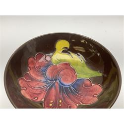 Small Moorcroft pin dish, decorated in the Hibiscus pattern with brown ground, D11cm