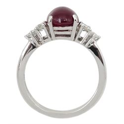 18ct white gold cabochon ruby ring, set with three round brilliant cut diamonds either side, hallmarked, ruby approx 3.20 carat, total diamond weight approx 0.55 carat