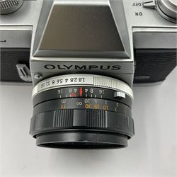 Olympus FTL camera body, serial no. 109019, with 'Olympus F.Zuiko Auto-S 1:1.8 f=50mm' lens serial no. 101434, in leather case 