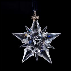 Nine Swarovski crystal snowflake Christmas ornaments, comprising years 1999-2005, 2010 and 2011, some with certificates, boxed (9)