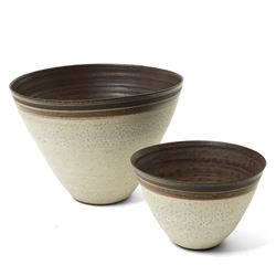 Sarah Butler and Martin Clark: Three works, comprising two bowls and a sleeve vase, each with incised potters mark to bases, and one with Heals mark, sleeve vase H24cm (3)