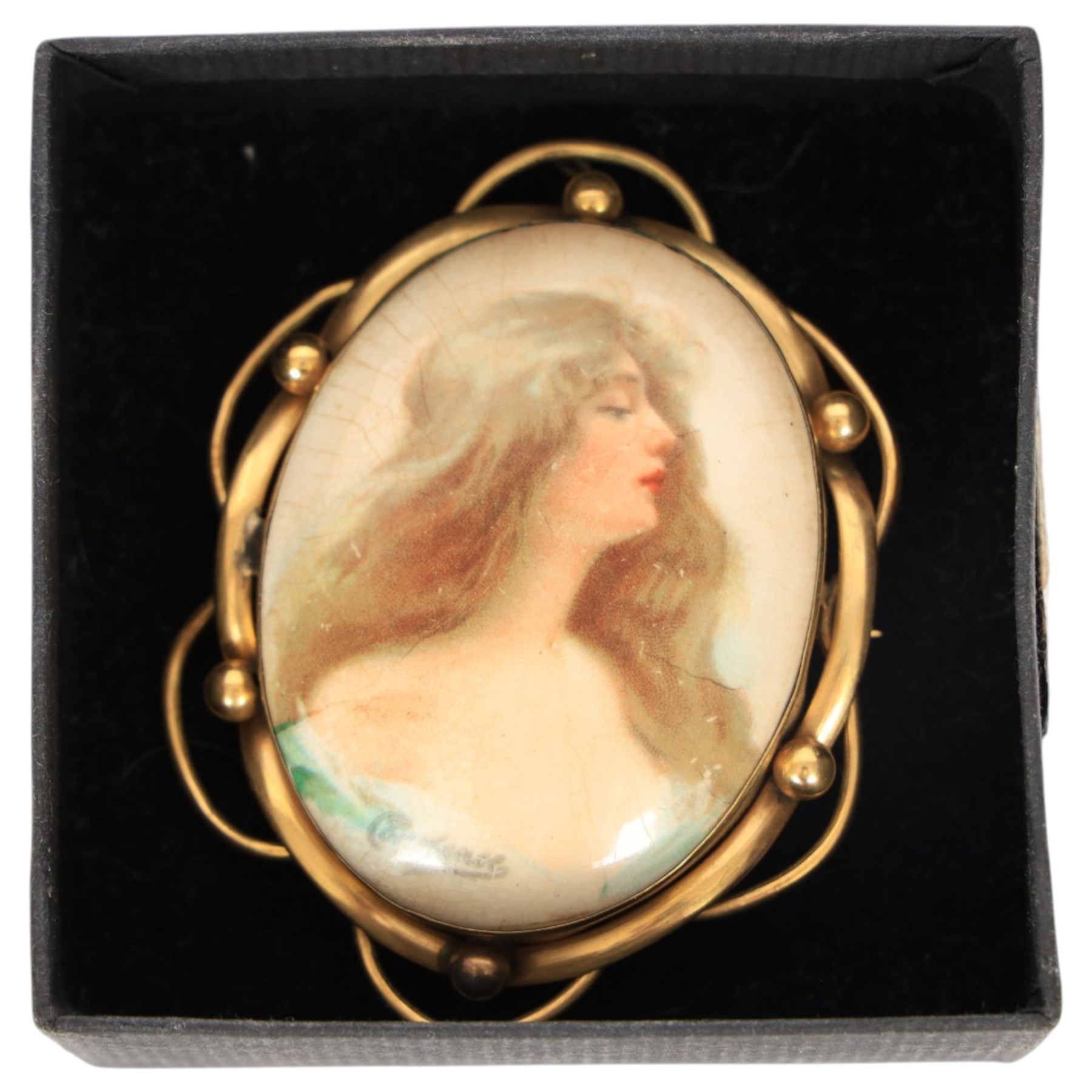 Trifari silver butterfly brooch and a gilt metal ceramic cameo brooch