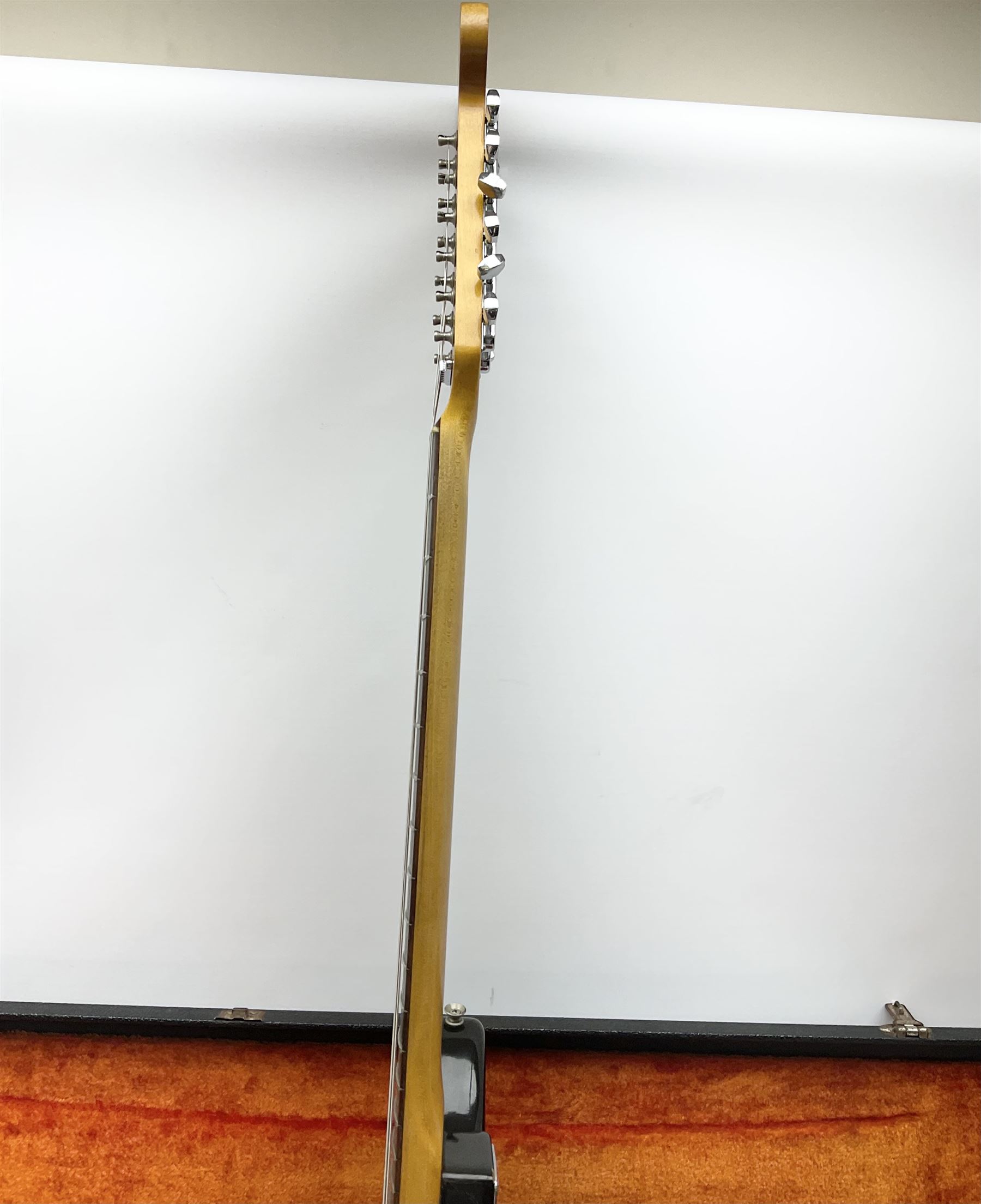 Fender three-tone Sunburst 12-string electric guitar c1965/6 Fullerton USA, with alder body and maple neck, the Indian rosewood fretboard with twenty-one frets and pearloid dot markers, fender electric XII bridge, F-stamp tuners (non-original), two split single coil pick-ups, master volume and tone and four-way switch, serial no.129730, L108cm; in original Fender case bearing label for Rivington Guitars New York with copy of original invoice; together with GuitarKes set-up and service certificate dated October 2021
