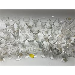 A large group of Victorian and later Victorian style drinking glasses, with part slice cut bowls. 