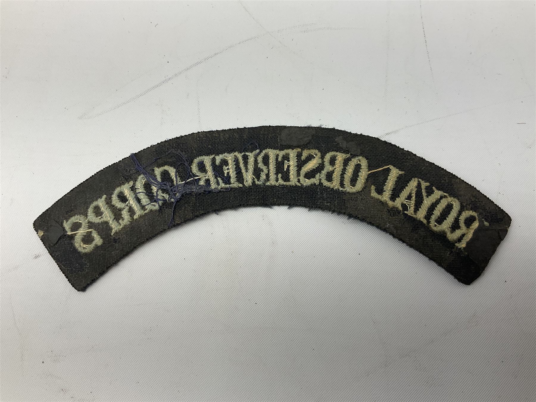 WW2 Royal Observer Corps - approximately one-hundred and seventy aircraft recognition cards; 1938 Instruction Booklet; cap badge and lapel badge; and cloth shoulder title