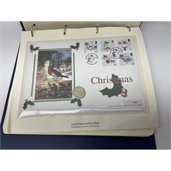 Coin covers and first day covers including, 2001 'Christmas' containing Isle of Man 2000 fifty pence, 2001 'Nobel Prize Centenary 1901-2001' containing 2001 two pounds, 2002 'Golden Jubilee 1952-2002' containing Bailiwick of Guernsey 2002 silver five pounds etc, housed in four ring binder folders