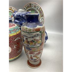 Collection of predominantly Chinese ceramics, to include pair of blue and white Foo dogs, pair of modern Famille Rose plates decorated with female figures, miniature garden seat, vases etc, together with carved soapstone teapot and cover