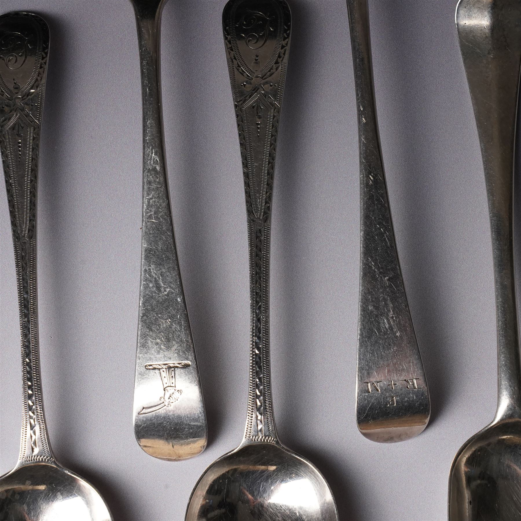 Pair of George III silver table spoons with engraved decoration London 1809 Maker Hester Bateman and eight other 19th century silver table spoons, various dates and makers (10) 