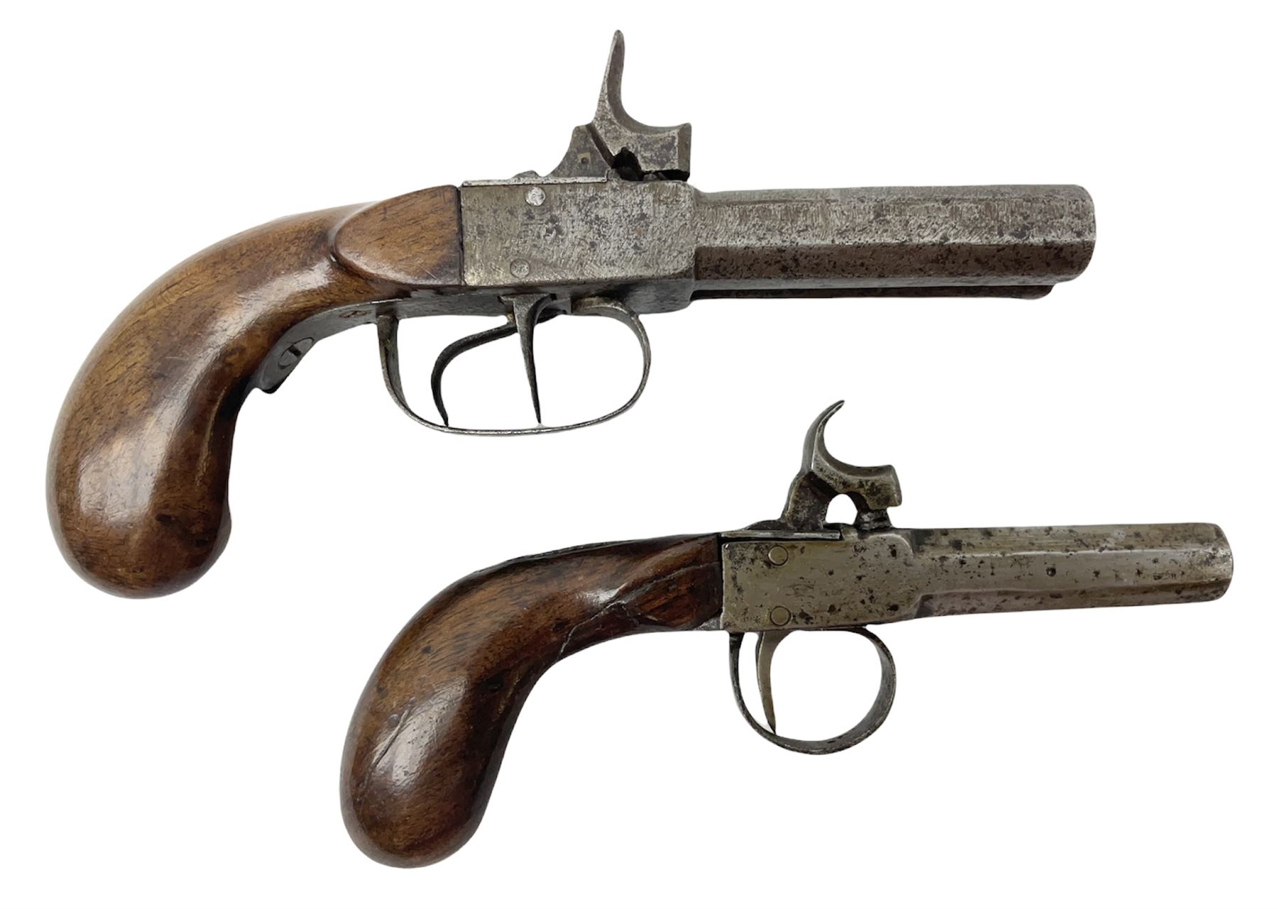 Mid 19th century double barrel percussion muff pistol, joined 7cm octagonal barrels with walnut stock19cm overall; a matching single barrel muff pistol 17cm overall (2)
