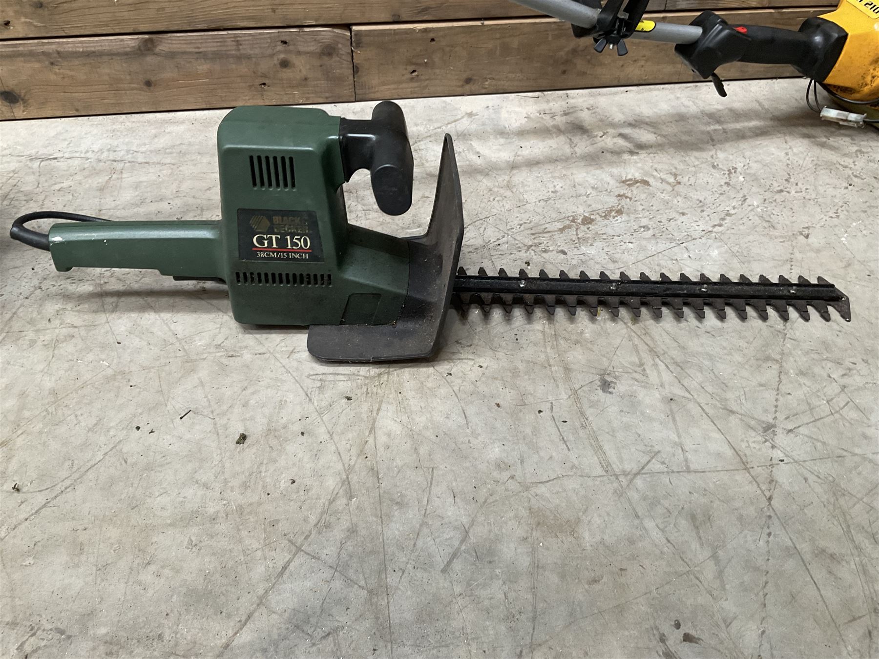 McCulloch TM210 petrol strimmer and a Black & Decker GT150 hedge cutter   