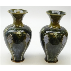  Pair of Royal Doulton stoneware vases, baluster form with flared rim decorated in relief with stylized foliage, impressed 8482B H21cm   