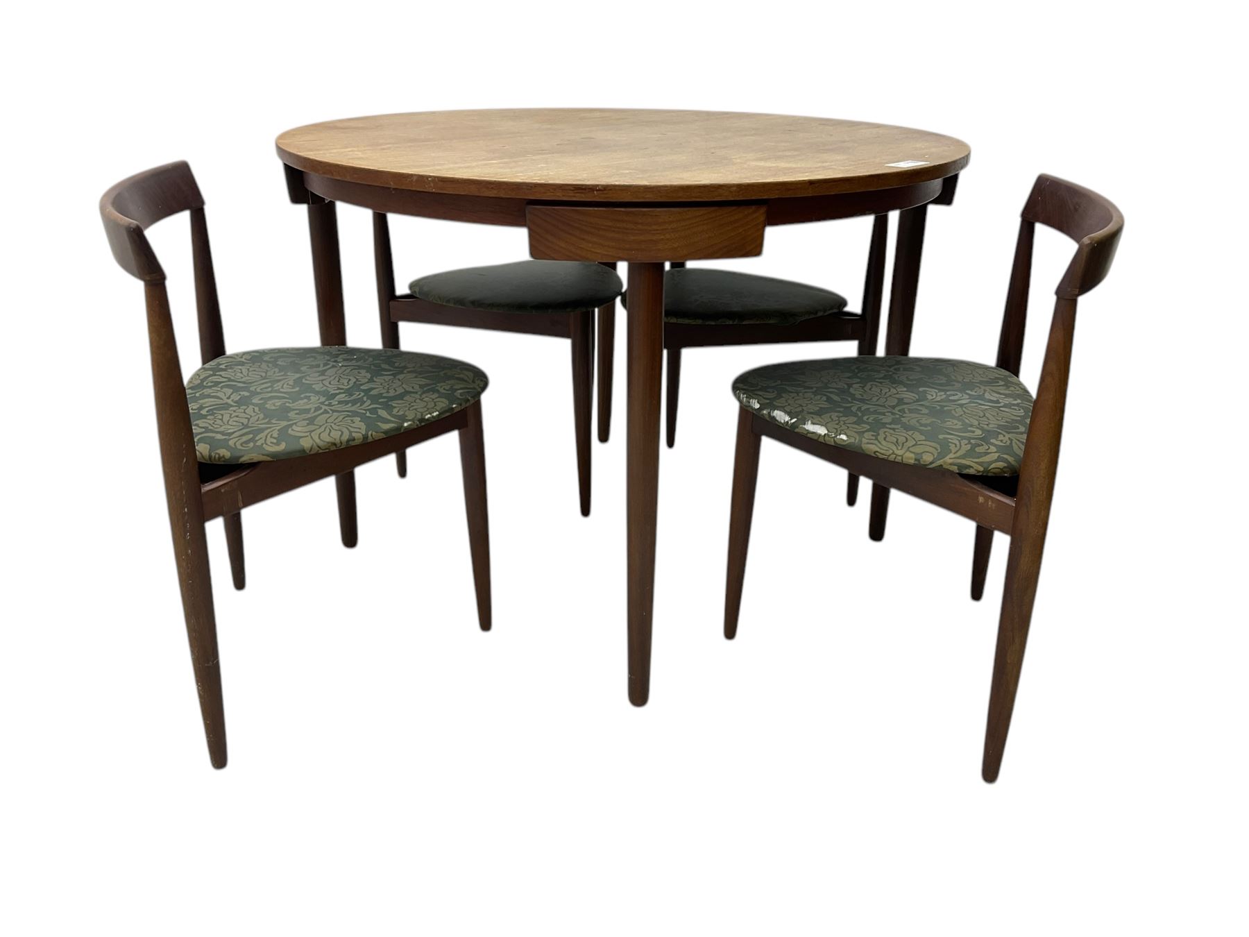 Hans Olsen for Frem Røjle - mid-20th century Danish teak 'Roundette' dining set, comprising a circular dining table raised on four tapering supports, paired with four matching chairs, each with a triangular seat upholstered in floral patterned fabric and raised on three tapering supports