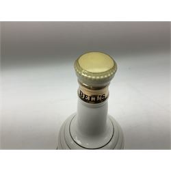 The Glenturret malt liqueur, 70cl, 35%vol and a Bell's Scotch Whisky decanter commemorating The marriage of Prince Andrew with Miss Sarah Ferguson 23rd July 1986, 75cl (2)