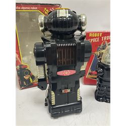 Three vintage battery operated robots comprising tin-plate Space Walk Man ME 100 Robot, Saturn the 13