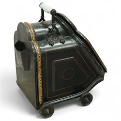 Victorian toleware coal scuttle, of shaped form hand-painted with fruit and floral spray to the hinged lid, with gilt line detailing, ceramic handle raised on wheels, brass coal shovel