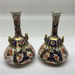 Pair of Royal Crown Derby 6299 imari pattern miniature vases, together with a miniature pitcher and dish in 2451 imari pattern, all with printed marks beneath, vase H12cm 