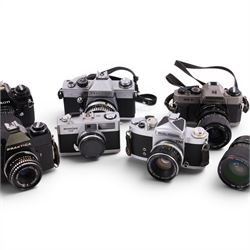 Collection of cameras, including Nikon F-301, Mamiya 135, Praktica LTL, Miranda M5-1N, Soligor TM, etc, with Sigma Zoom Master 1:2.8-4, f=35-70mm lens, Tokina 28-85mm 1:3.5-4.5 lens, etc