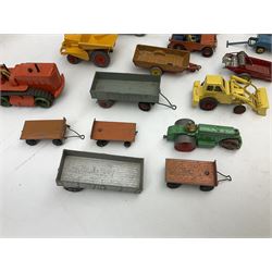 Dinky - nineteen unboxed and playworn/repainted die-cast models including Muir Hill Dumper, Muir Hill 2WL and Heavy Tractor; all repainted; Coles Mobile Crane, two Aveling-Barford steam rollers; Massey-Harris tractor and manure spreader; Land Rover; nine various trailers etc (19)