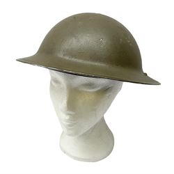 WW2 British steel helmet, the liner marked 71/4 TTC 2  1940, with original green textured paint finish