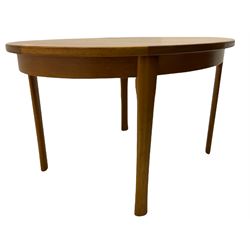 Mid 20th century oval teak dining table, extending with leaf, and four chairs