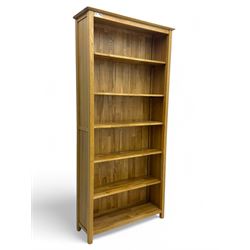 Light oak open bookcase, five adjustable shelves  