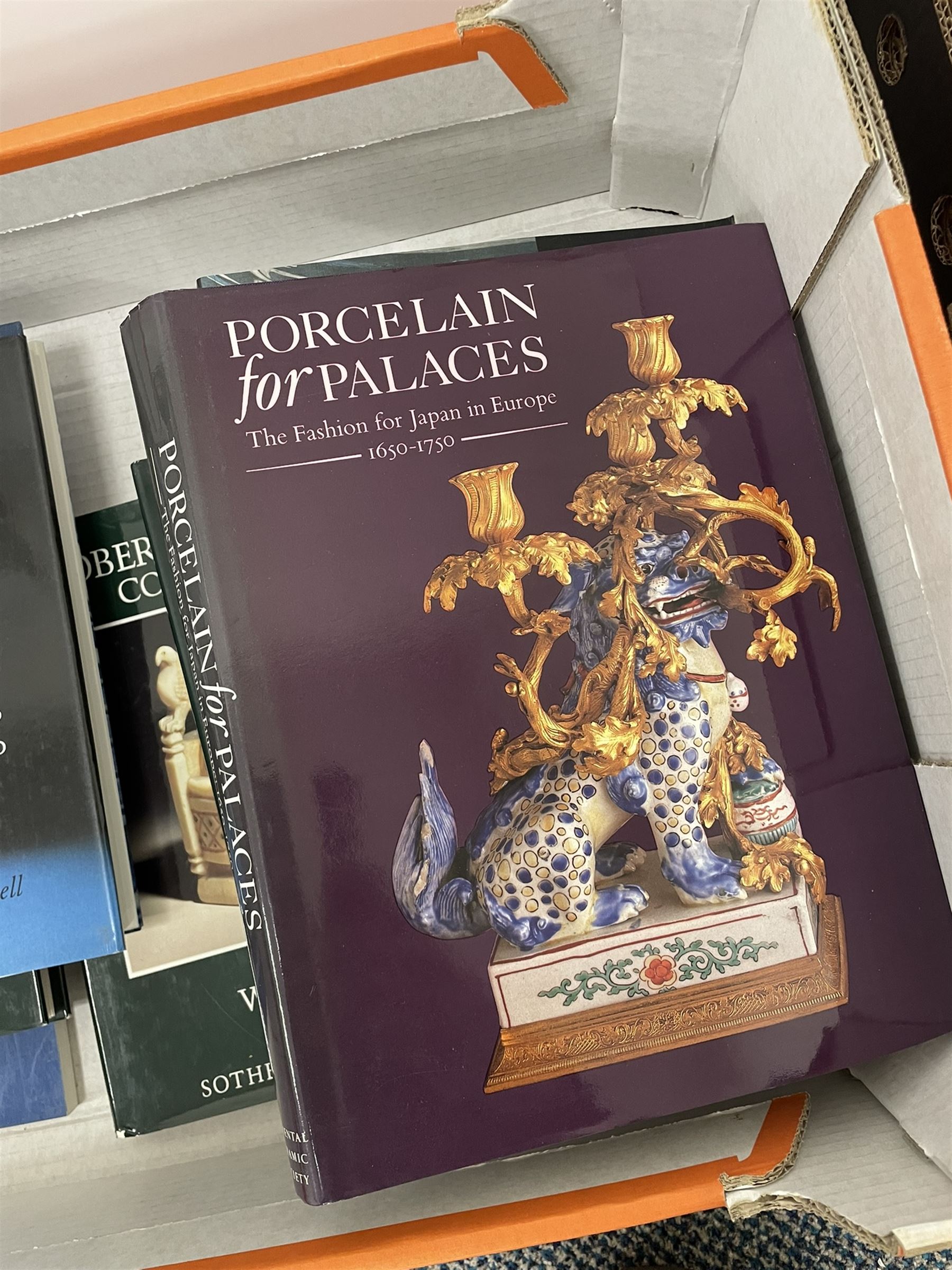 Box of antiques reference books - including Robert von Hirsch Collection catalogues; 'Glasgow Girls' Ed. by Jude Burkhauser; 'Blue & White, Chinese Porcelain Around the World' by John Carswell; Porcelain for Palaces, The Fashion for Japan In Europe', Celadon Wares; etc.